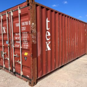 Red shipping container in storage yard